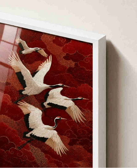 Cranes over red clouds