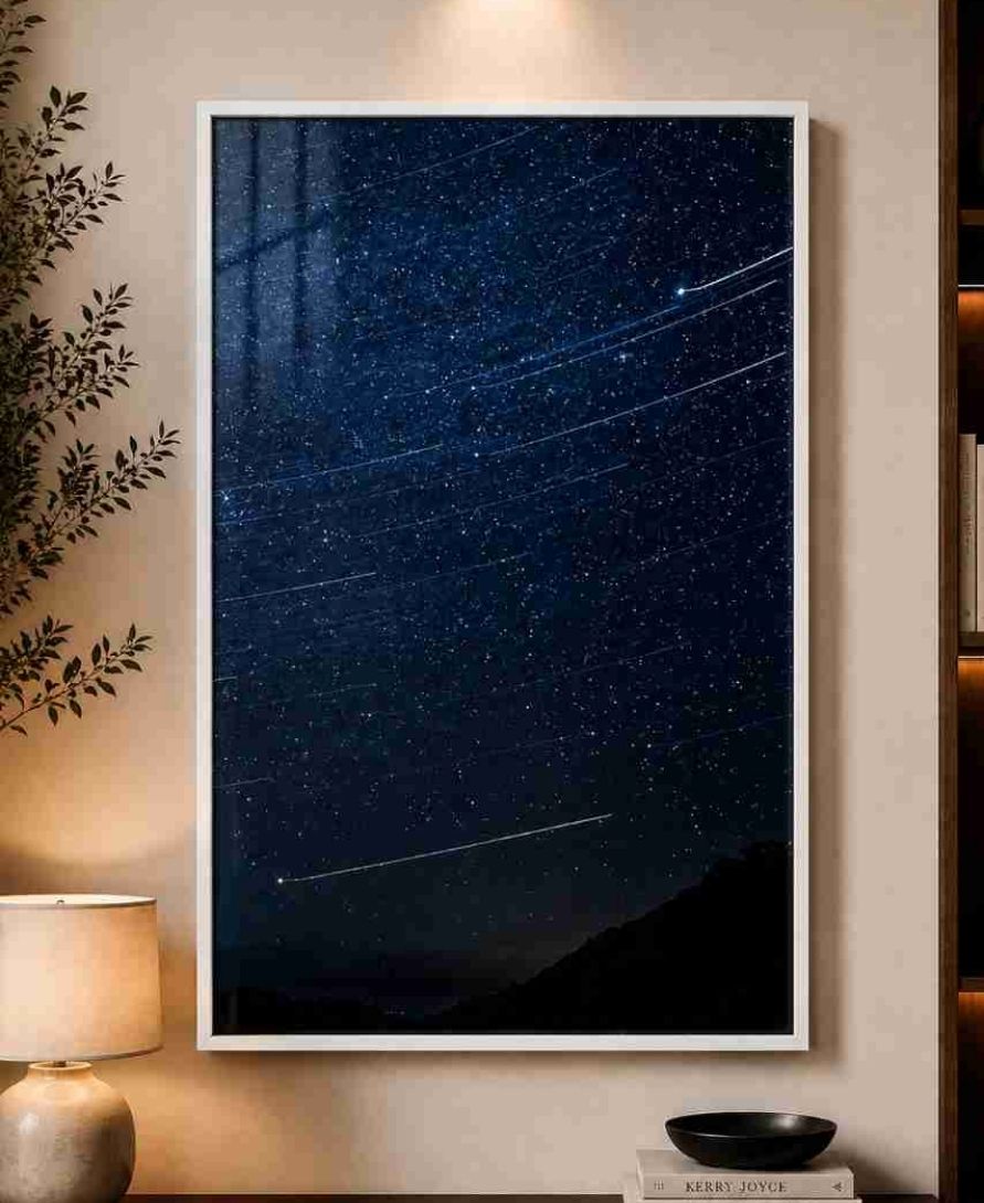 Star trails over mountains