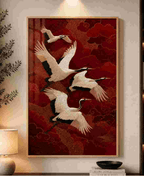 Cranes over red clouds